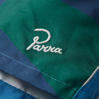 THE FESTIVAL FENCE SWIM SHORTS