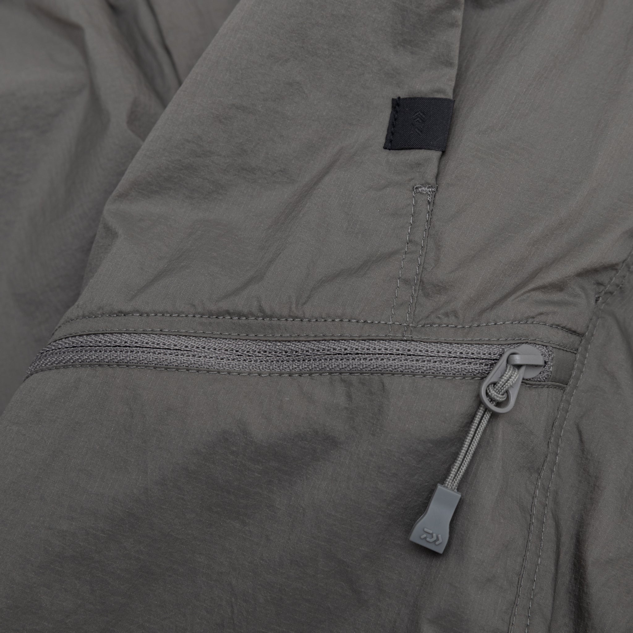 TECH WIND SHELL SHORTS