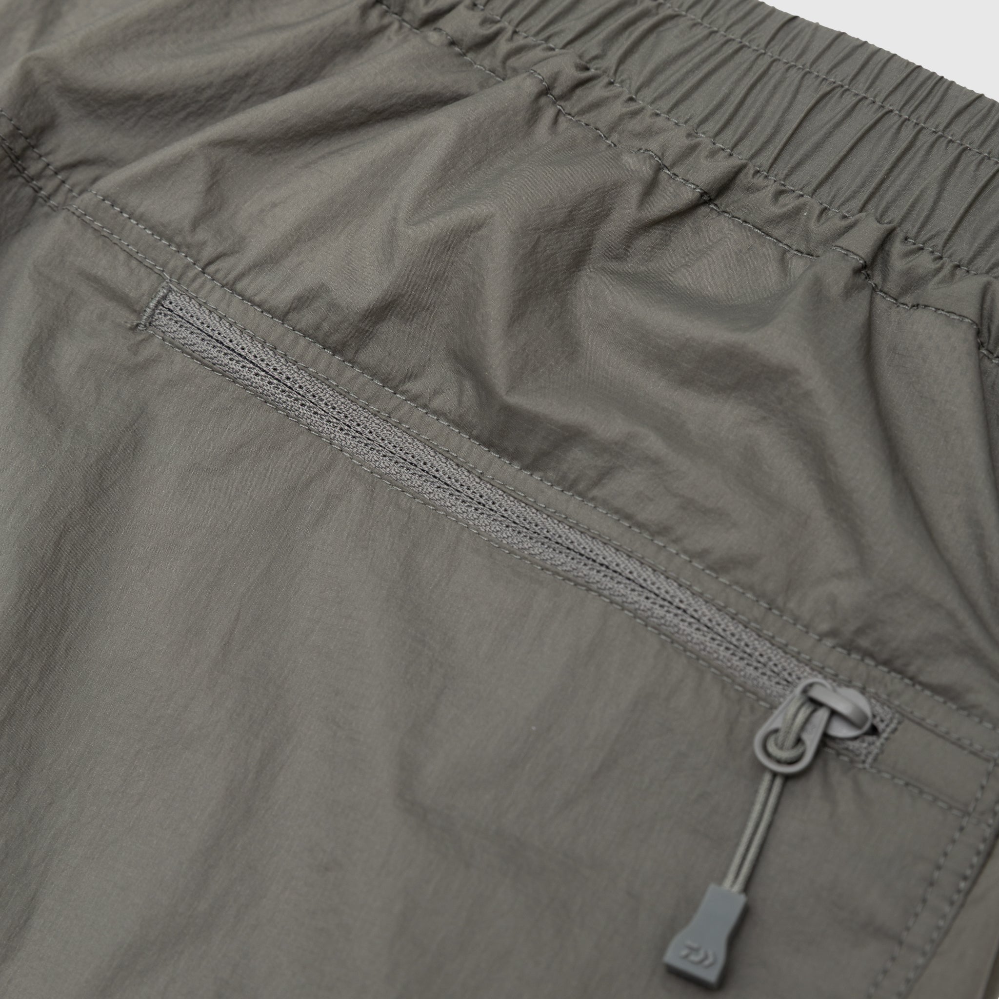 TECH WIND SHELL SHORTS