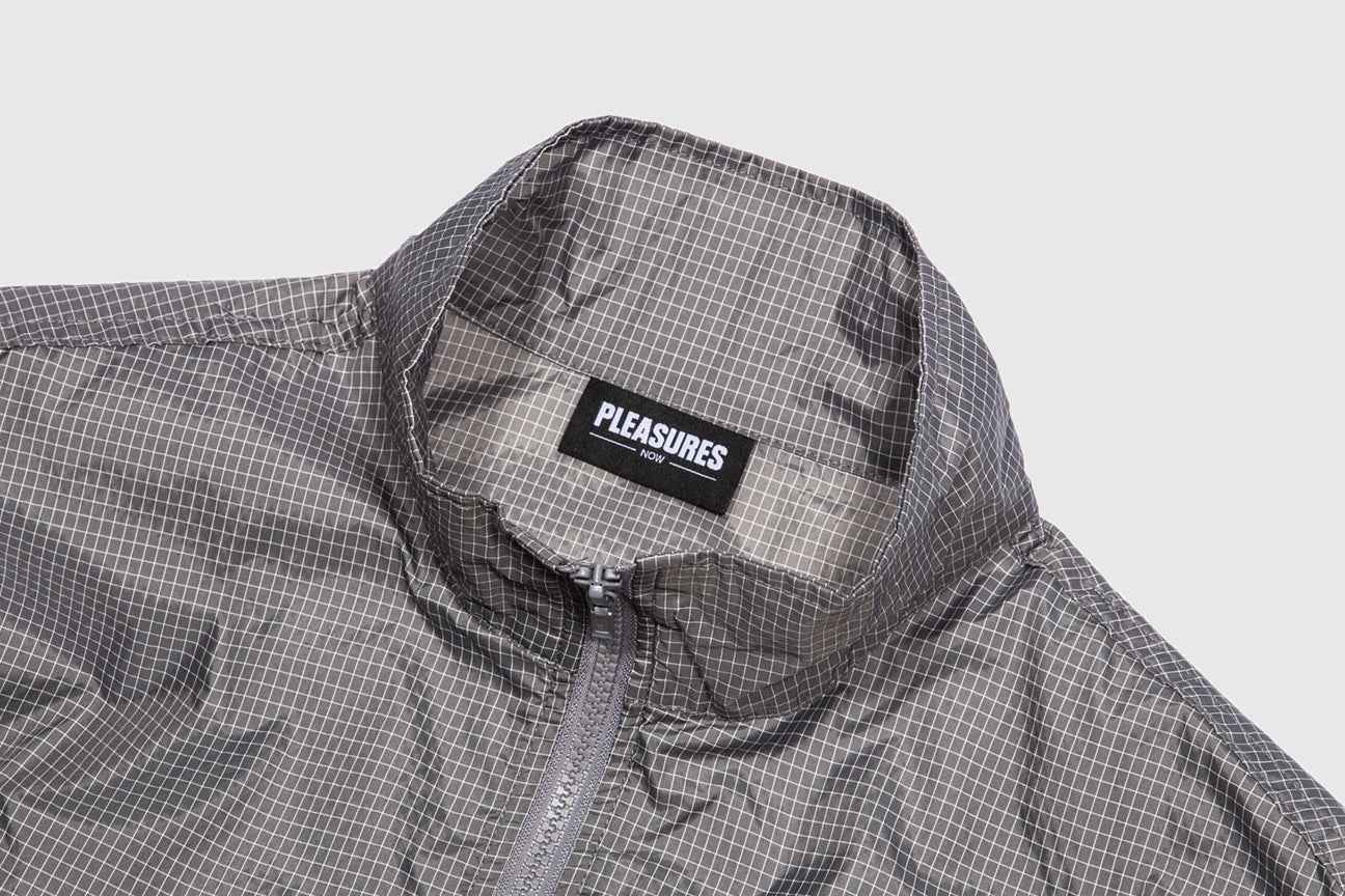 PLEASURES BRICK TECH TRACK JACKET